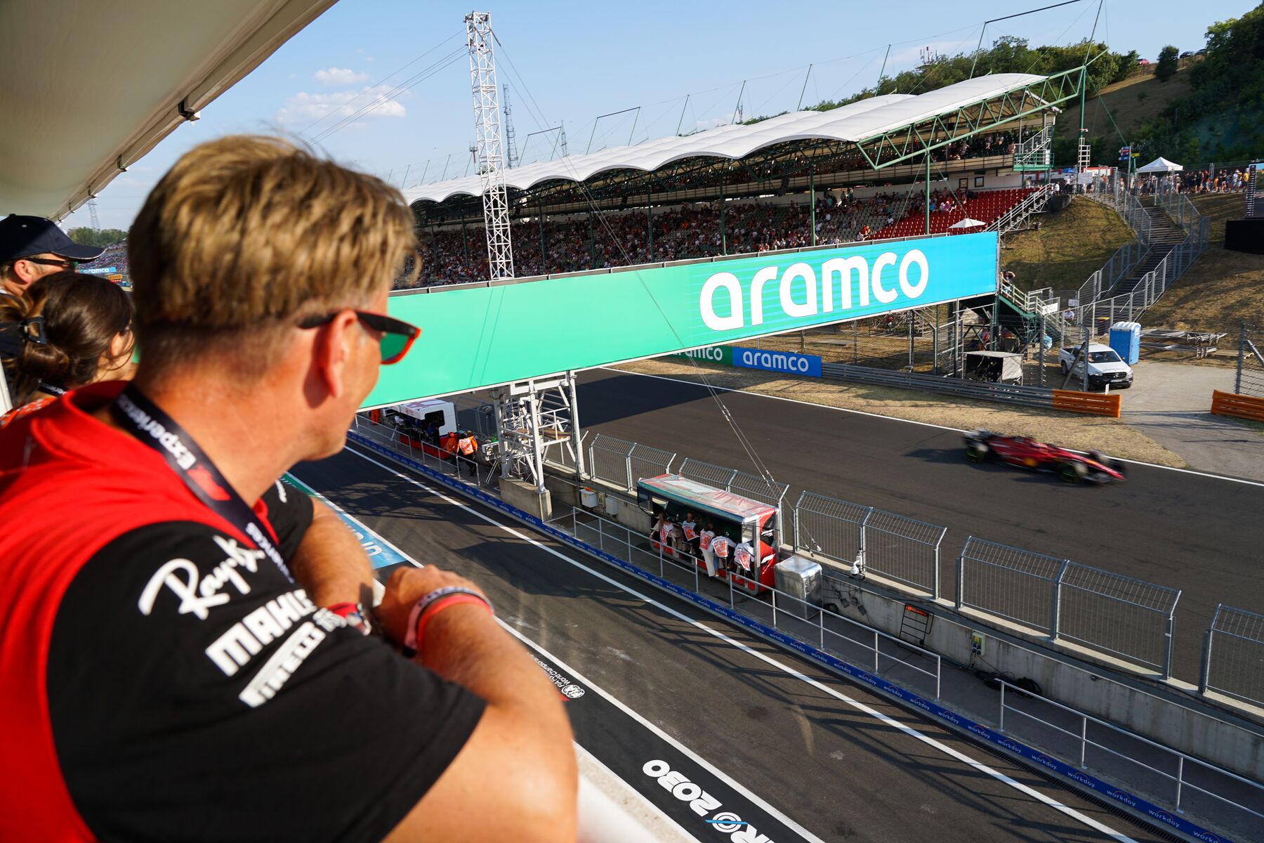 Champions Club trackside view of an F1 car passing the main straight