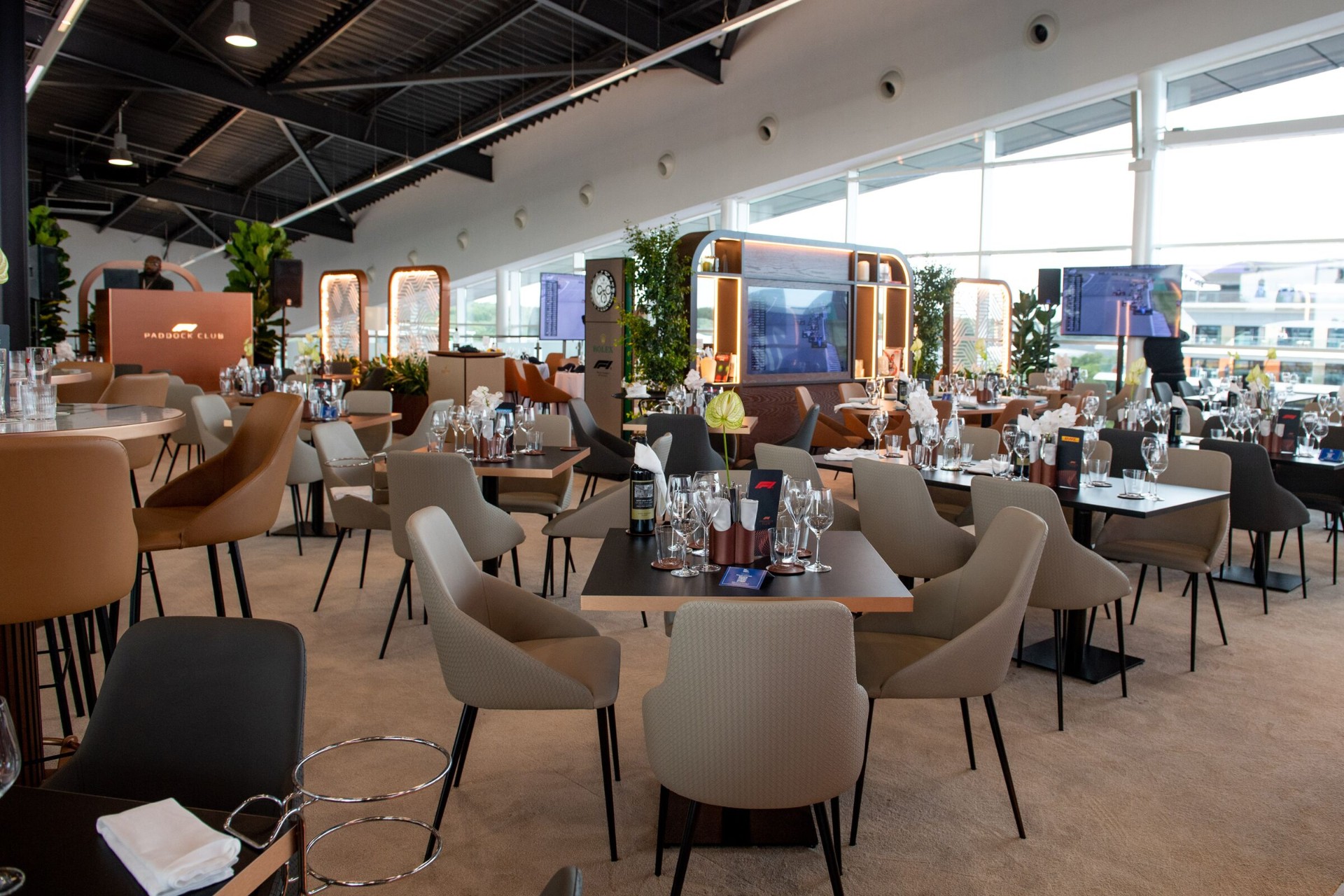 Paddock Club interior at the British Grand Prix with fine dining setup