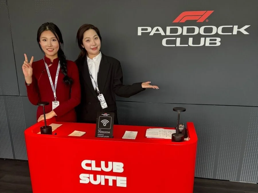 Paddock Club Suite hostesses welcoming guests